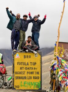 A group of men standing on a sign