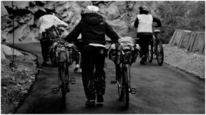 A group of people riding bicycles