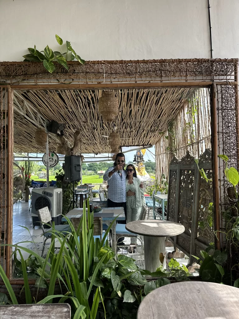 A man and a woman taking a mirror selfie