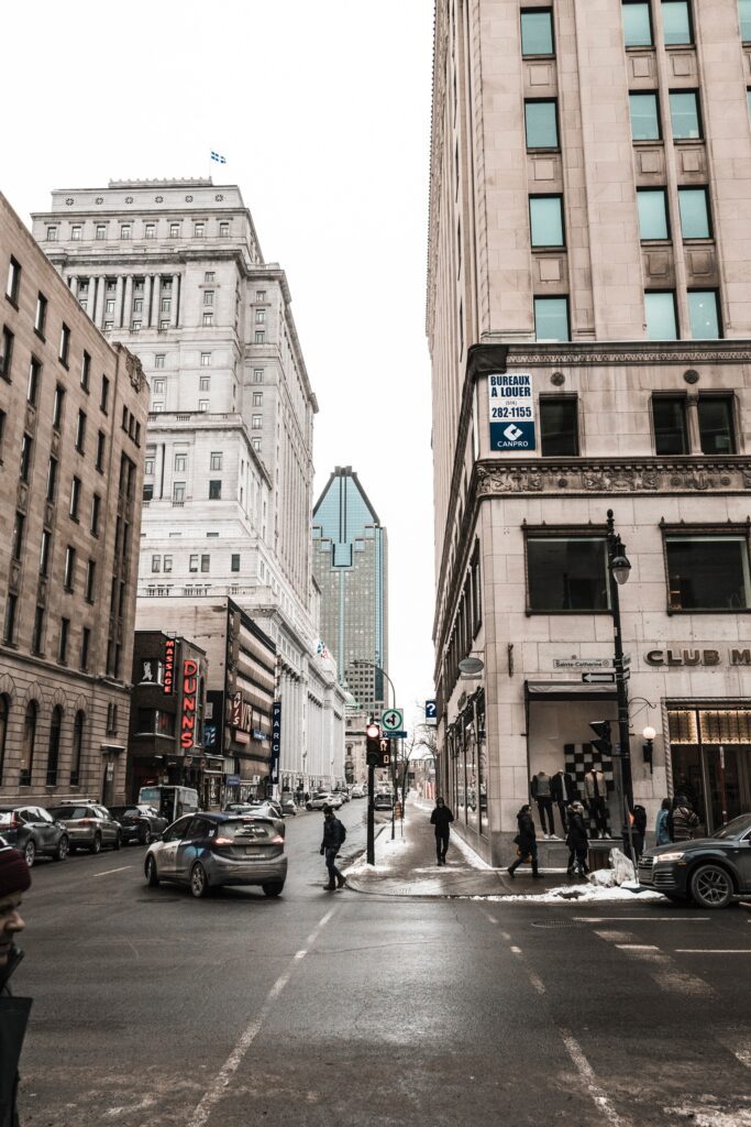 a street with cars and people on it