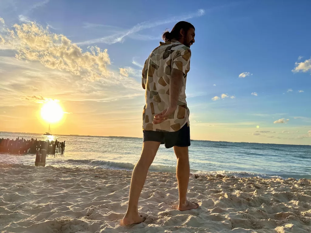 A person walking on a beach