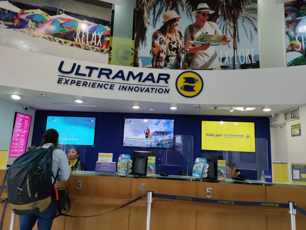 A person at the counter of Ultramar ferry ride