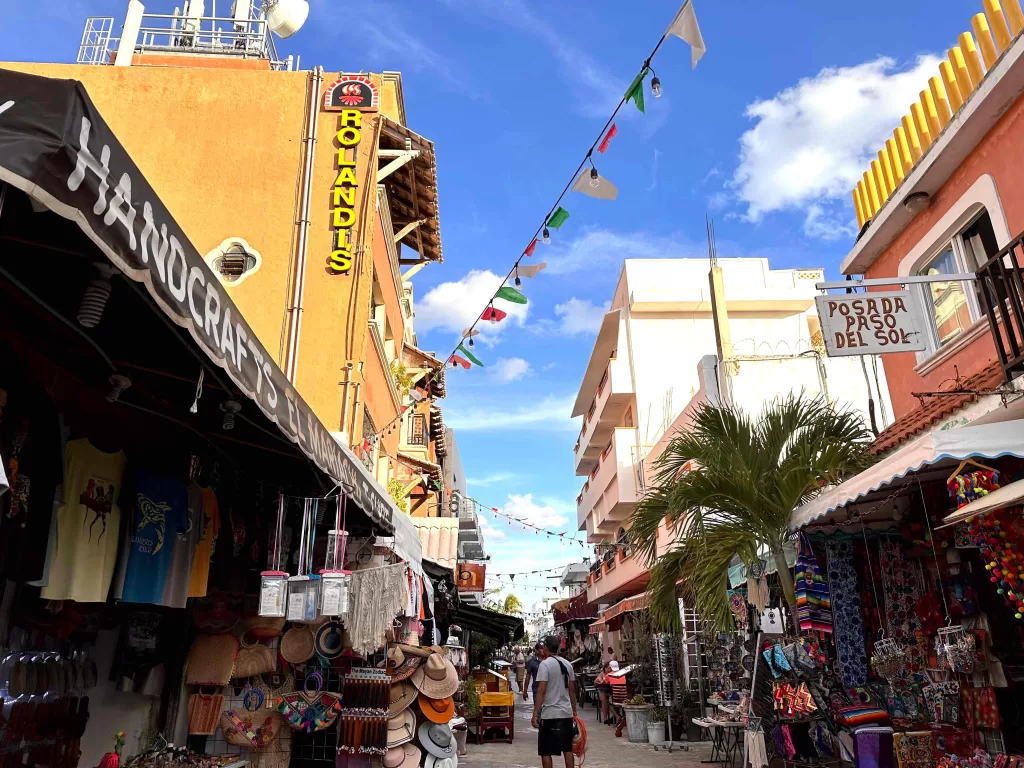 A street with shops and people on it