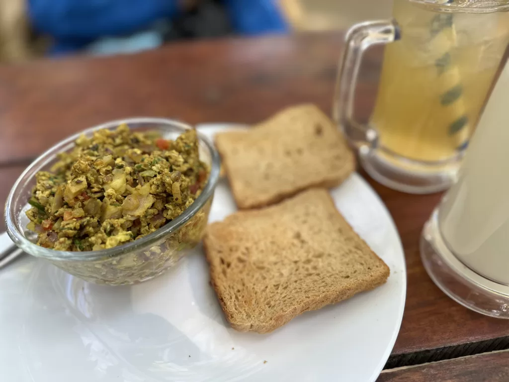 A plate of food and a mug of beer