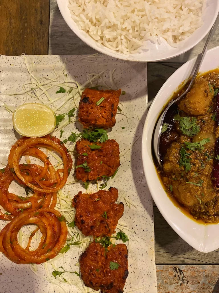 A table with a plate of food.