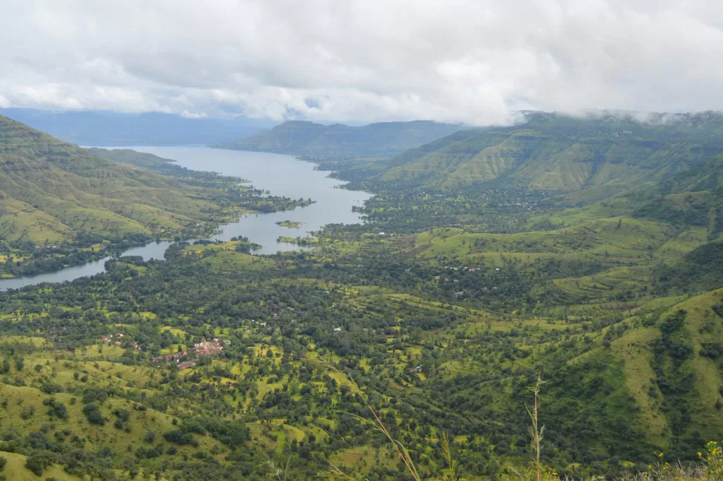 A landscape with a body of water and mountains