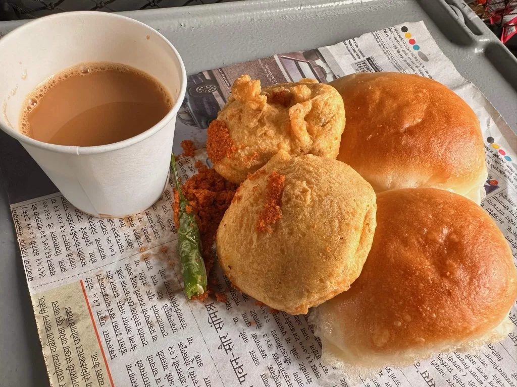 A plate of food and a cup of tea