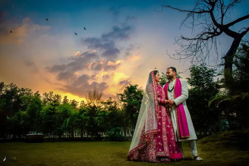 A person and person in traditional Indian attire