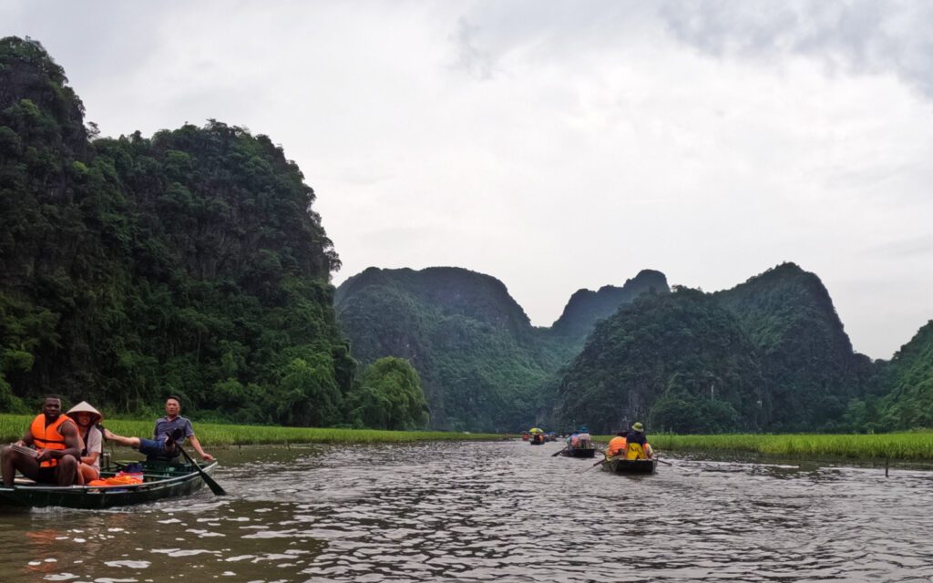 River with limestone rocks and boats