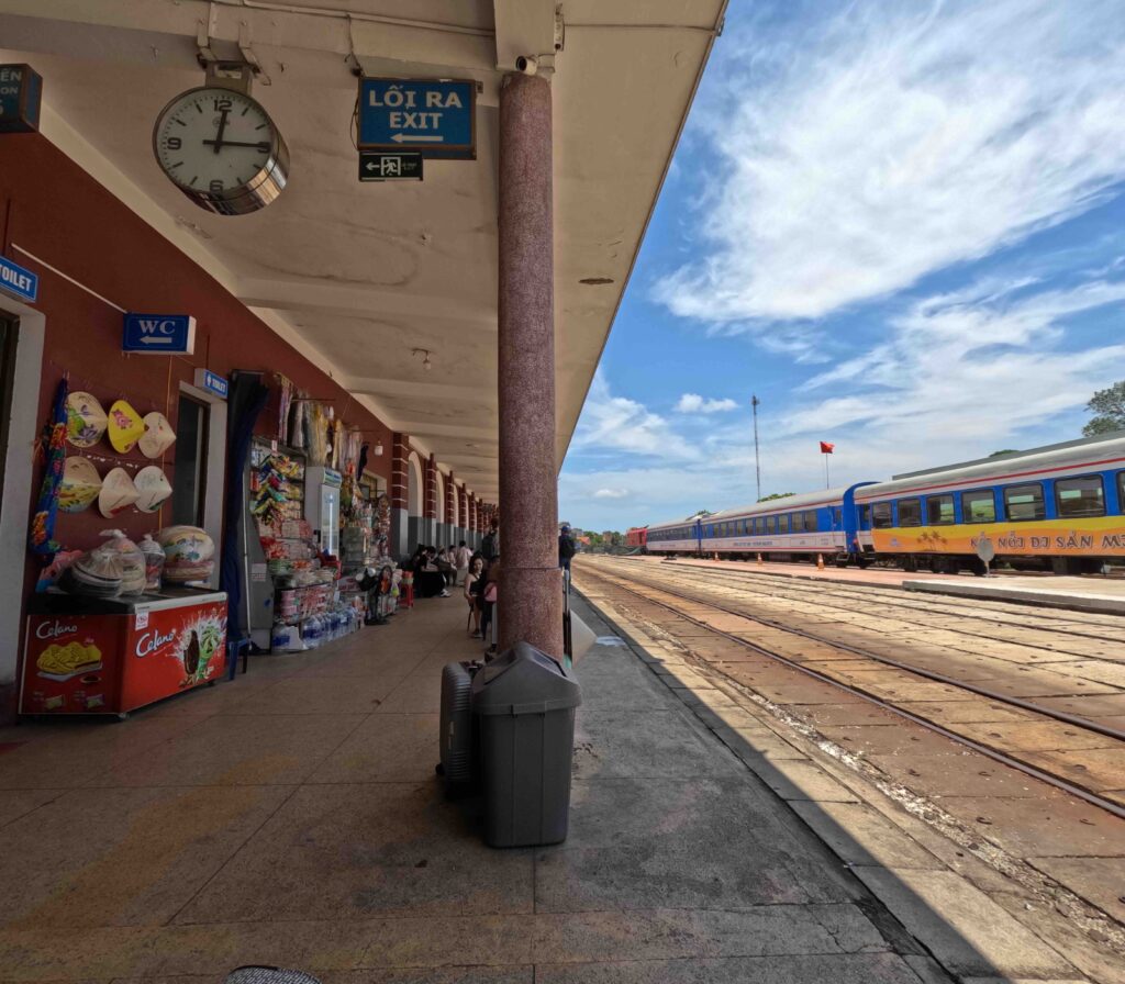 A platform with train tracks.