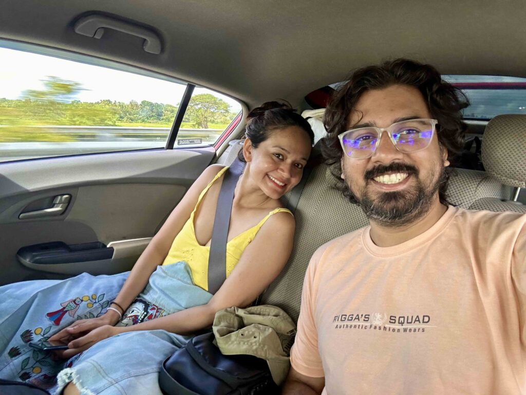A man and a woman going to Arugam Bay in Taxi.